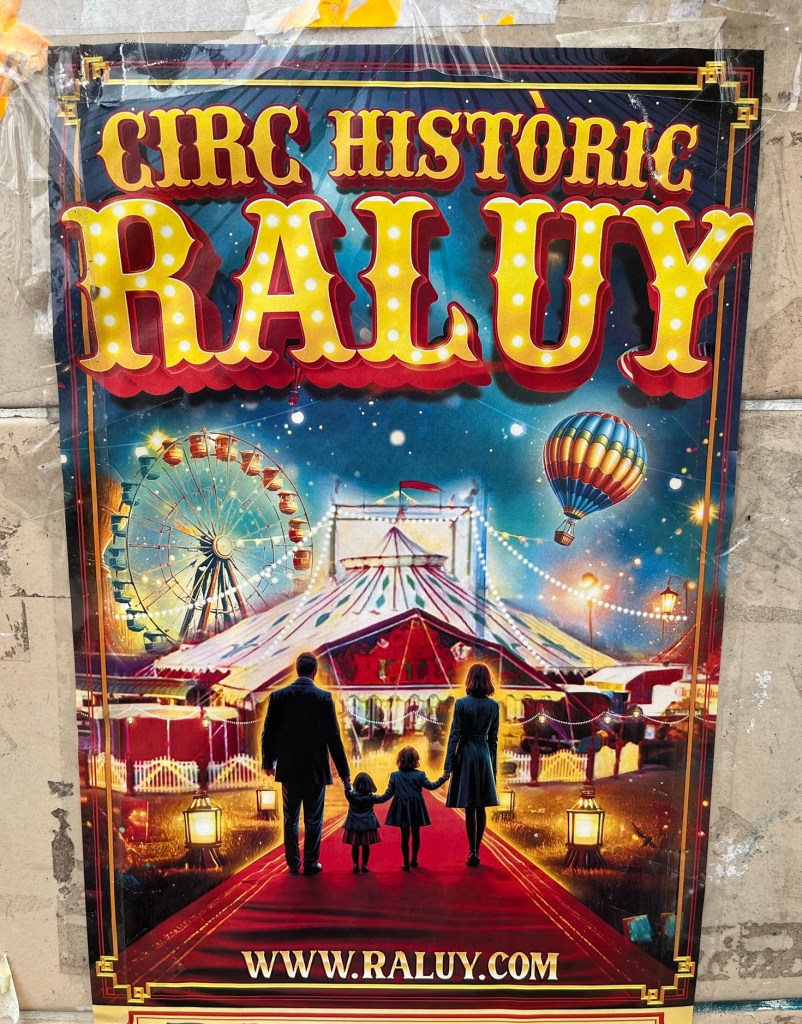 A poster with the title “Circ Històric Raluy” featuring a colorful circus scene, a family walking on a red carpet, a lit-up ferris wheel, and a hot air balloon. The image looks as if it was AI-generated.